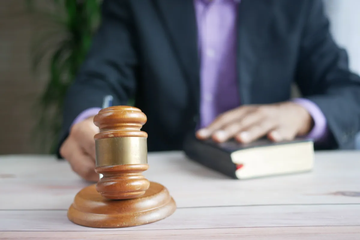 Gavel resting on a sound block, symbolising regulatory compliance