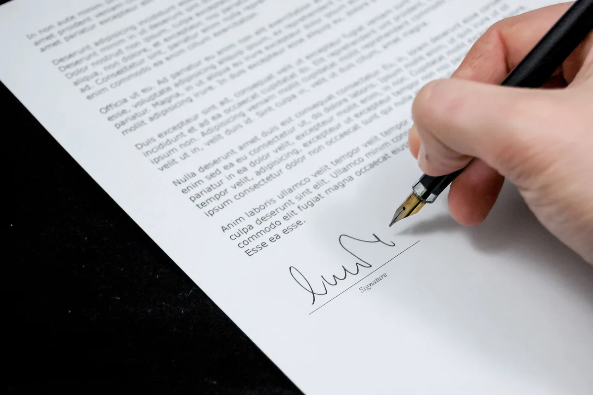 Close-up of a legal document being prepared