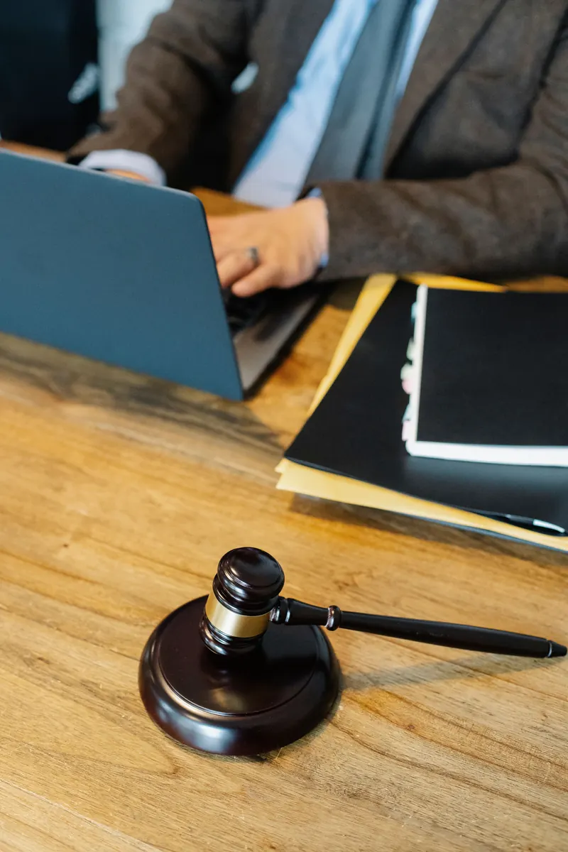 Laptop and gavel representing online GST filing